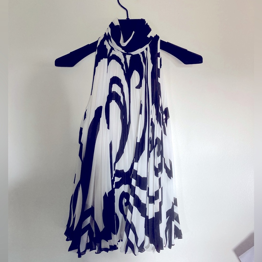 St. John black and white sleeveless top.